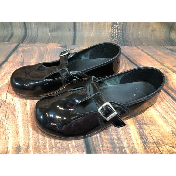 sanita black patent leather clogs